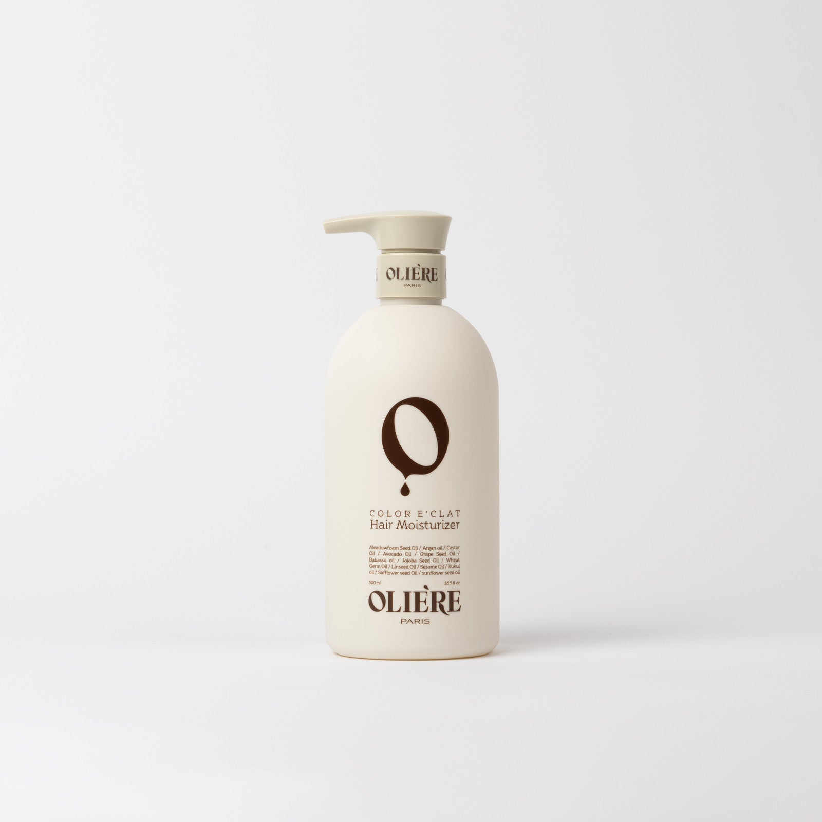 A bottle of Olière Color & Clat Hair Moisturizer with a beige pump dispenser and a cream-colored bottle, set against a plain light gray background.